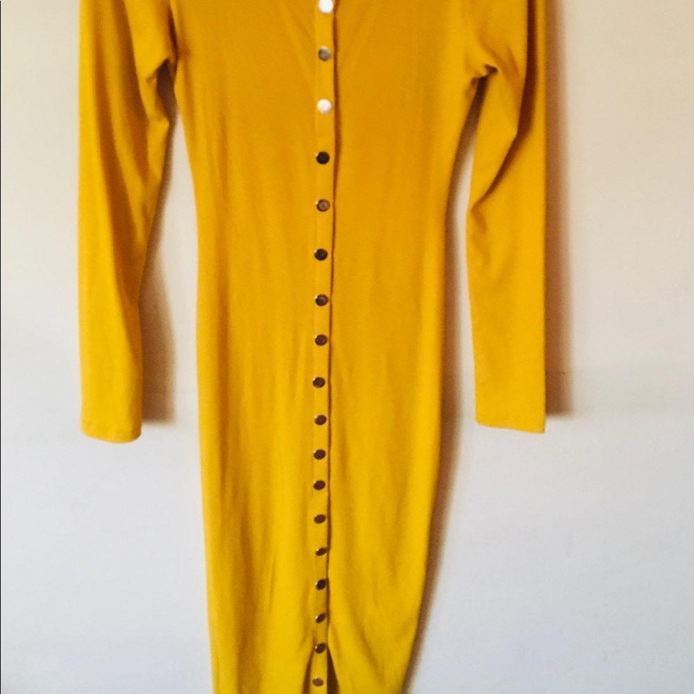 Yellow button dress.